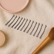 Secure hold metal hair bobby pins featuring wavy grip design