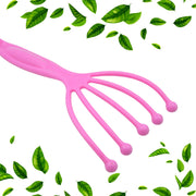 Person gently using the handheld scalp massager on their head for relaxation.