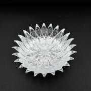 Multipurpose silver finish tray showcasing dry fruits, ideal for festive gatherings.