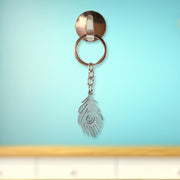 Elegant laser-cut peacock feather keychain accessory
