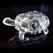 Clear crystal turtle statue for Feng Shui and Vastu, bringing positive energy.