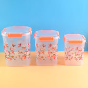 Airtight Food Storage Set with square floral containers in three sizes.