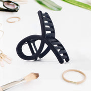 Multiple plastic hair clamps in a simple matte finish