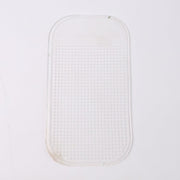 Clear anti-slip dashboard mat blending with vehicle interior