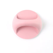 Plastic adhesive handle grip attached on a drawer