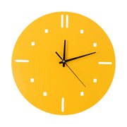 Elegant yellow silent wall clock displaying clear time