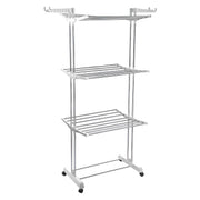 The 3-tier stainless steel drying rack with wheels, fully loaded with laundry.