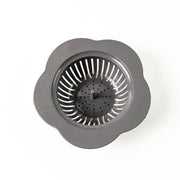 Flower-patterned plastic kitchen sink strainer for trapping debris