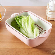 Front view of a rotatable strainer basket, perfect for quick rinsing.