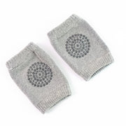 Wool knit knee sleeves for toddlers in grey for warm and cushioned support