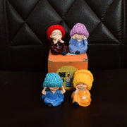 Resin monk Buddha set packaged in compact gift box ready for gifting or home decoration