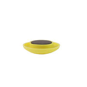 Stack of bright yellow circular plastic magnetic buttons