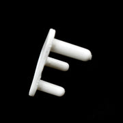 Pack of 100 white baby socket covers, essential for child safety in homes.