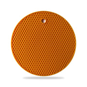Flexible silicone trivet functioning as an outdoor drink cover.