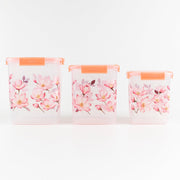 Stackable floral food storage container set with transparent bodies.