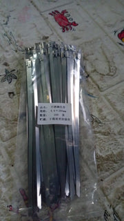 Versatile stainless steel cable ties shown in various applications, including automotive and industrial use.