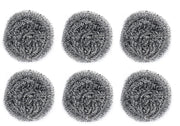 Close-up of a long-lasting round stainless steel scrubber in hand.