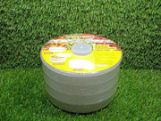 The complete Tidy Table white plastic sprout maker, demonstrating its compact and functional form.