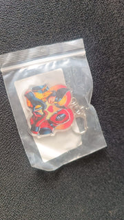 Colorful acrylic keychain featuring cartoon design with metal hardware for easy clipping