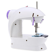 Close-up of the mini sewing machine's needle and thread for fabric stitching.