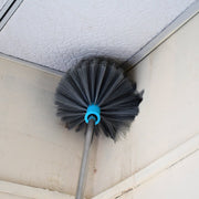 Durable stainless steel handle of the cobweb cleaning brush for sturdy high-reach cleaning.