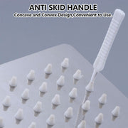The shower nozzle cleaning brush set ready for use in a bathroom setting.