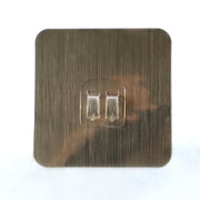 Versatile self-adhesive wall hook on a clean white background.