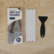 Application of anti-slip strips on bathroom floor for safety