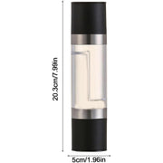 Manual dual-chamber salt and pepper grinder being used in kitchen
