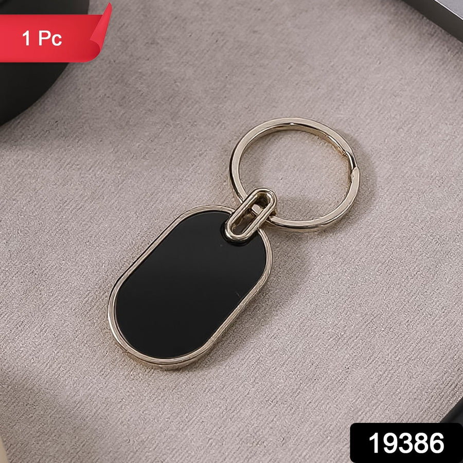 Oval Metal Keychain – Elegant Black & Silver Finish for Everyday Use