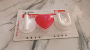 Multi-purpose adhesive hooks mounted on tile and glass surfaces