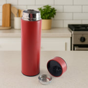 Close-up of red insulated water bottle highlighting the LED temperature screen.