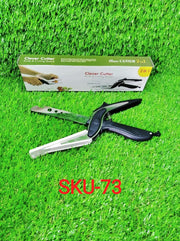Versatile clever cutter in black, highlighting its food-grade stainless steel construction.