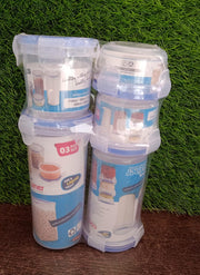 An organised display of multiple round airtight food storage containers on a kitchen shelf.