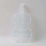 Compact violin-shaped storage container for small accessories
