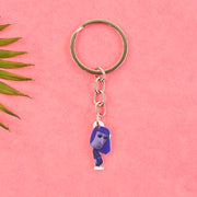 Close-up of big cartoon character keychain showing metal ring